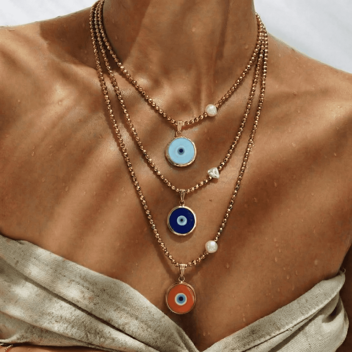 Baby Blue Glass Evil Eye Necklace with Gold Hematite & Pearl
