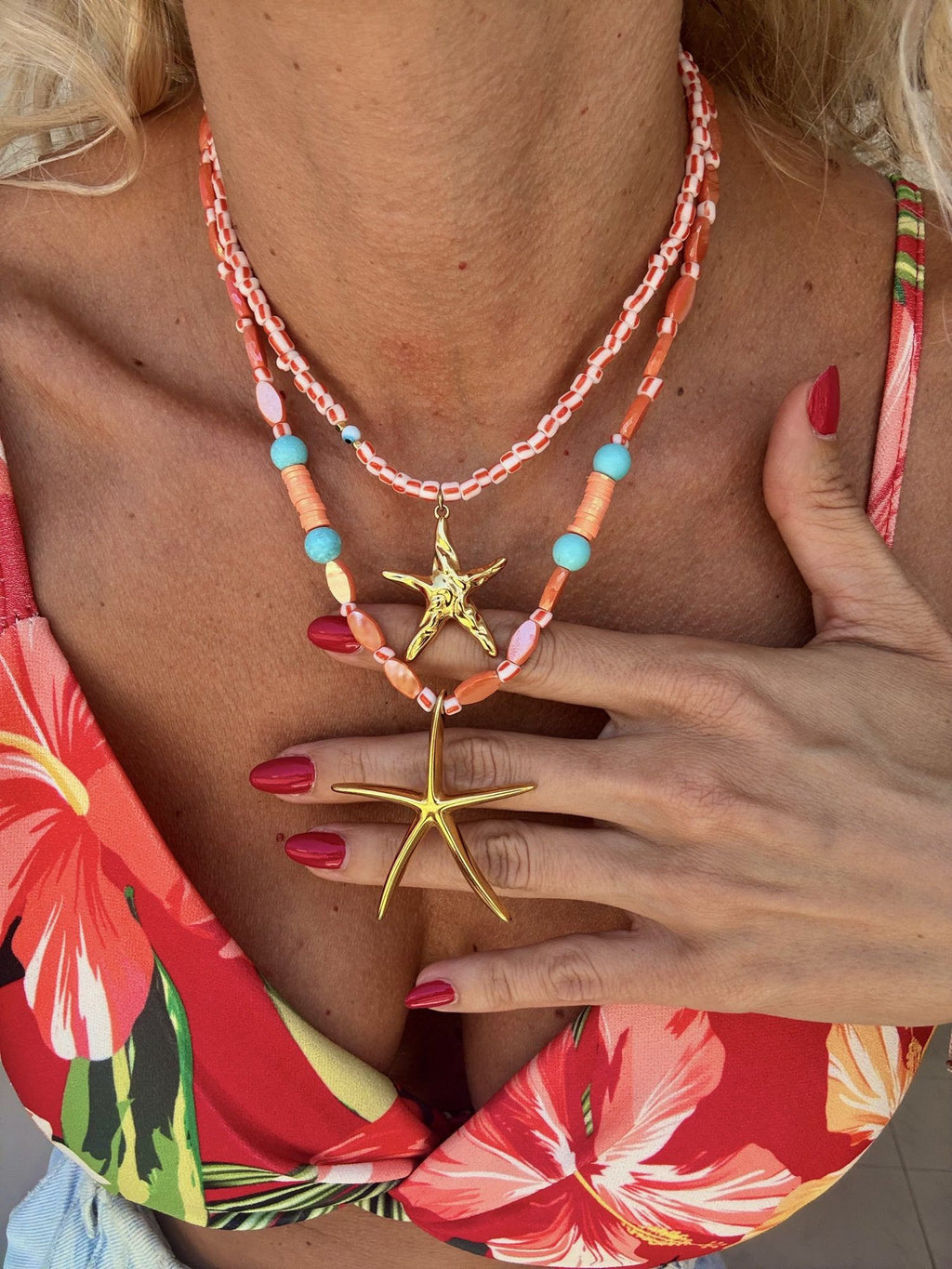 Orange beaded summer necklace with large starfish charm