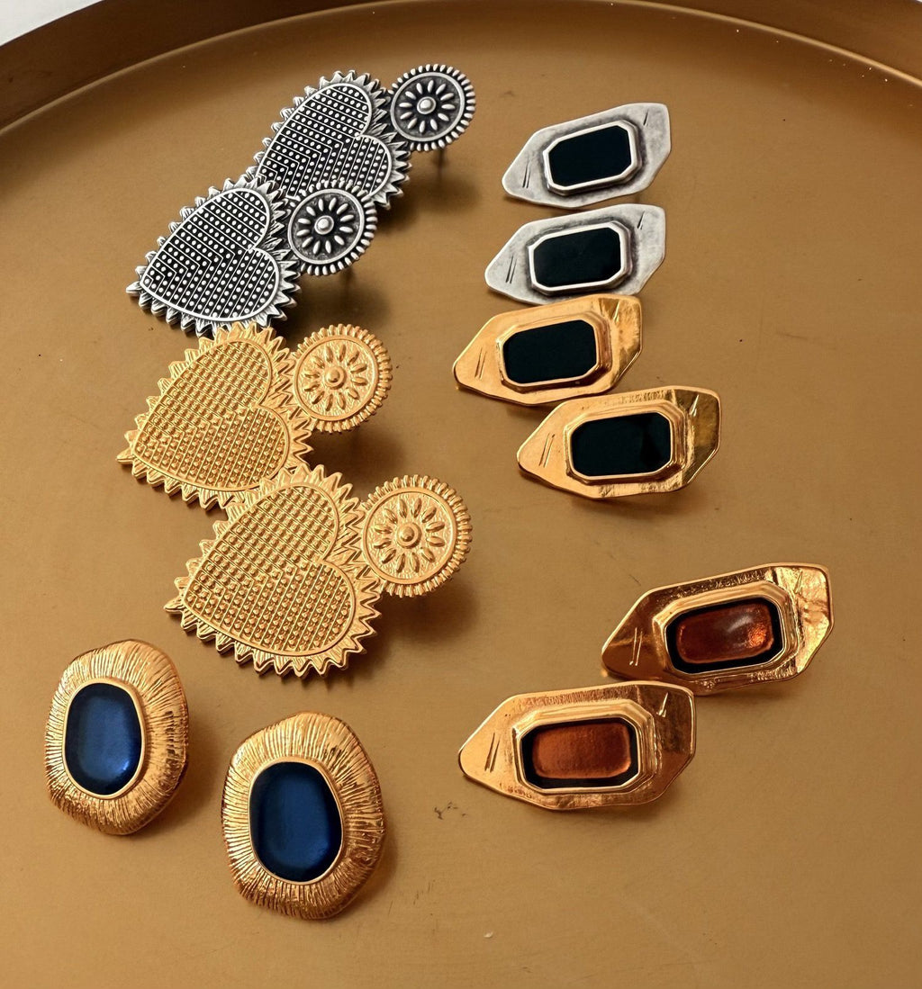 Vintage style gold earring with blue enamel