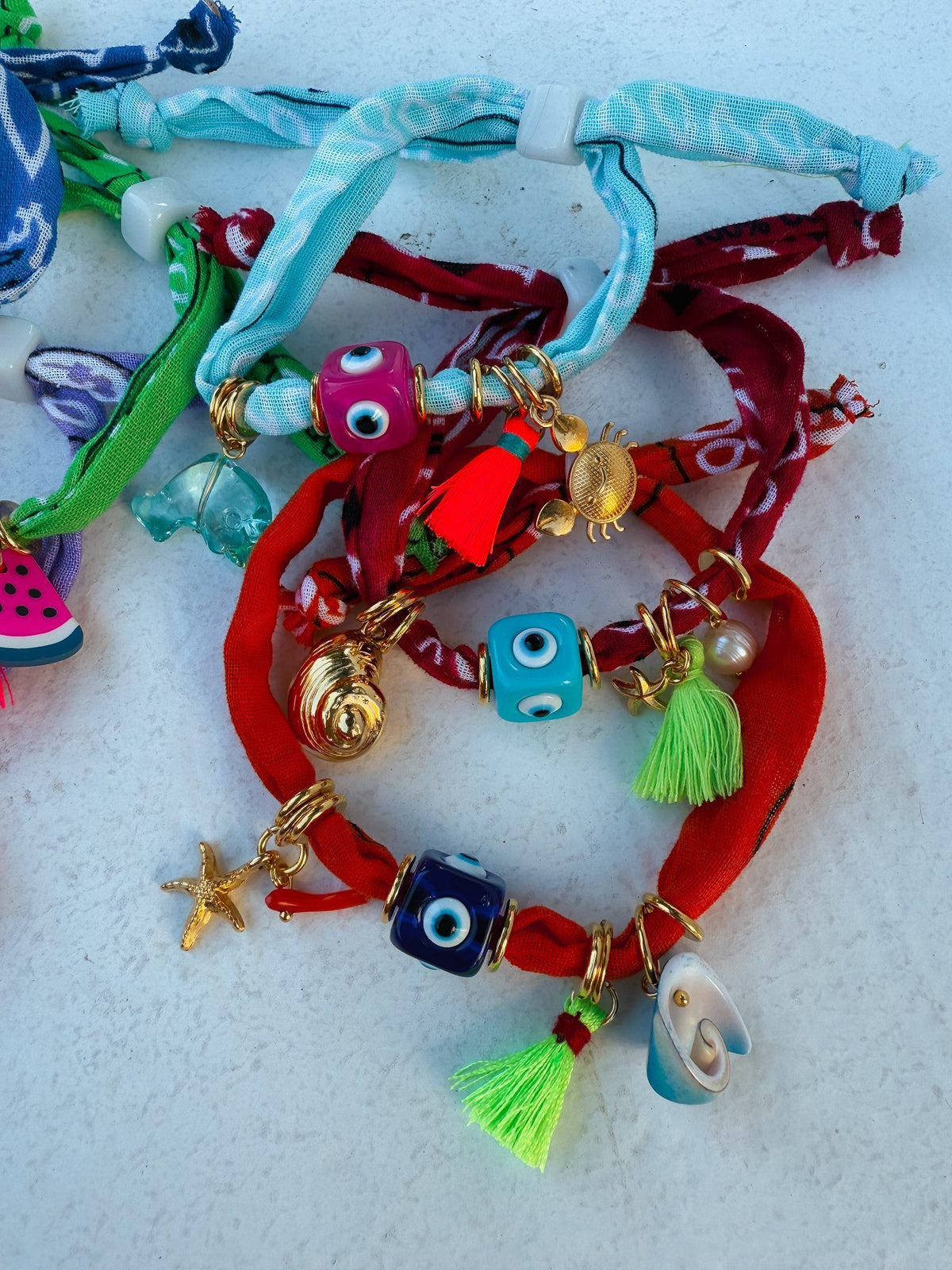 Red Bandana scarf bracelets with cube eyes and tassels
