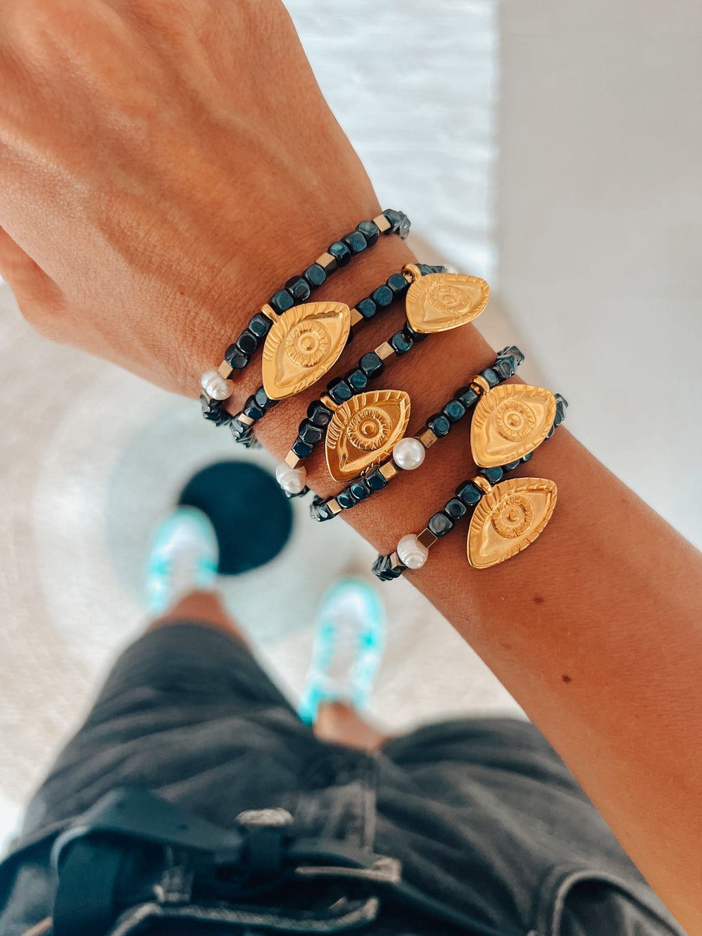 Semiprecious hematite bracelet with golden eye