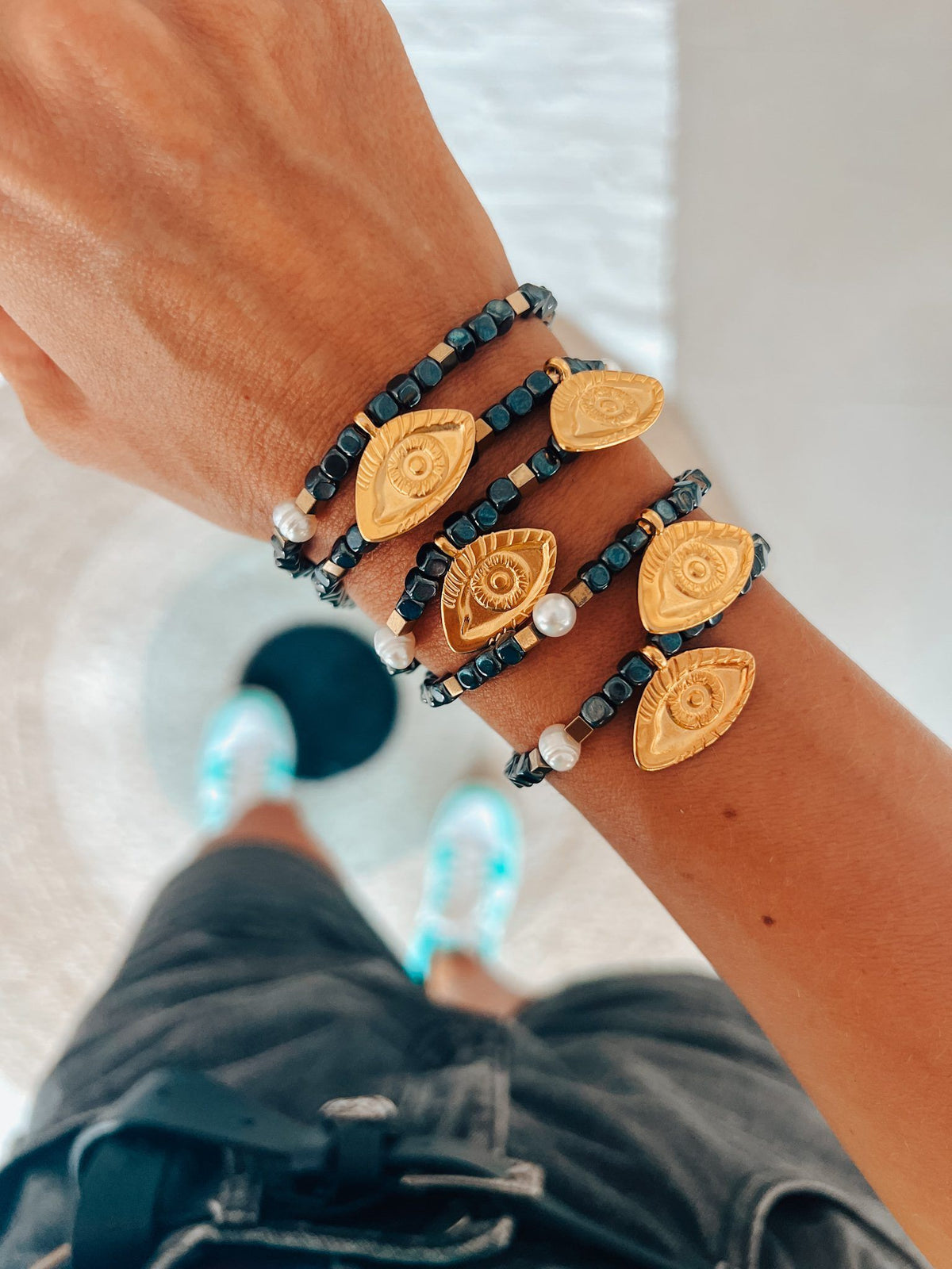 Semiprecious hematite bracelet with golden eye