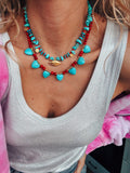 Turquoise and red beaded necklace with eye