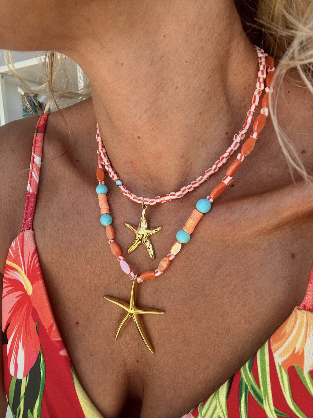Orange beaded summer necklace with large starfish charm