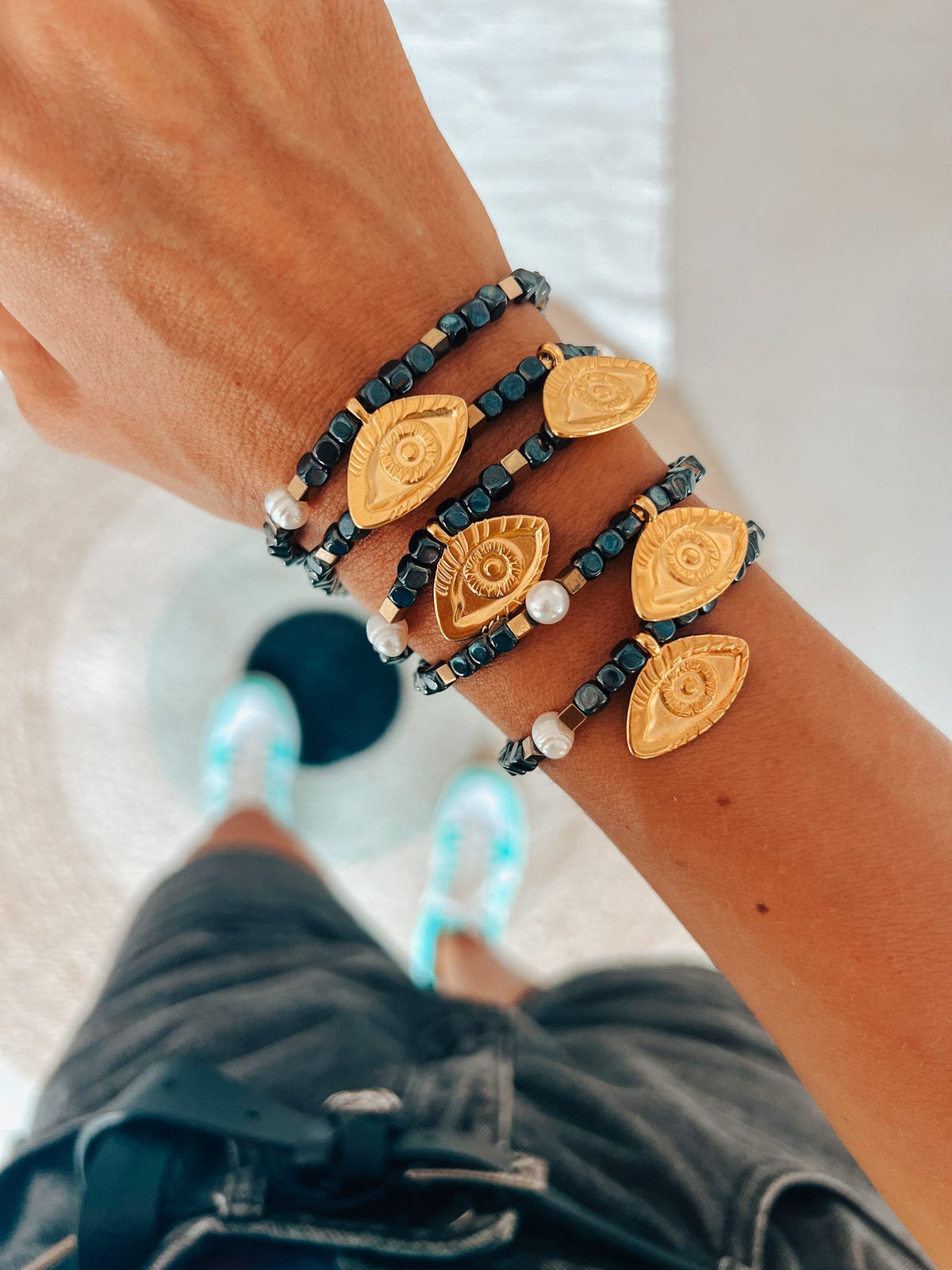 Semiprecious hematite bracelet with golden eye