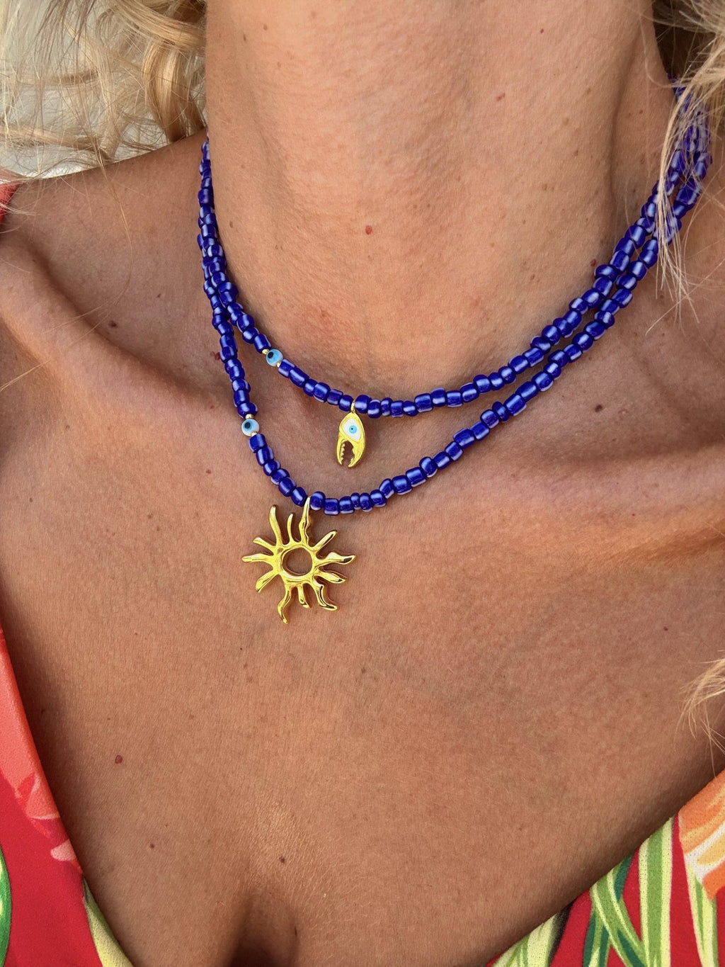Aegean blue beaded summer necklace with sun
