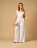 Apoella Aigina Straw Clutch Beige lifestyle front.jpg