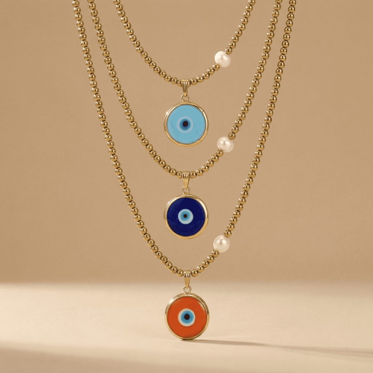Baby Blue Glass Evil Eye Necklace with Gold Hematite & Pearl