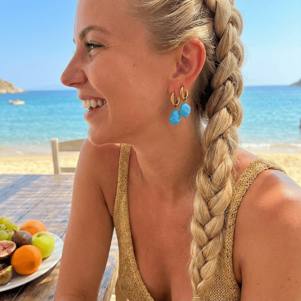 Steel gold hoops with baby blue ceramic