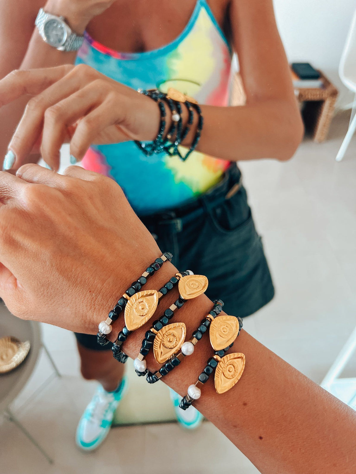 Semiprecious hematite bracelet with golden eye