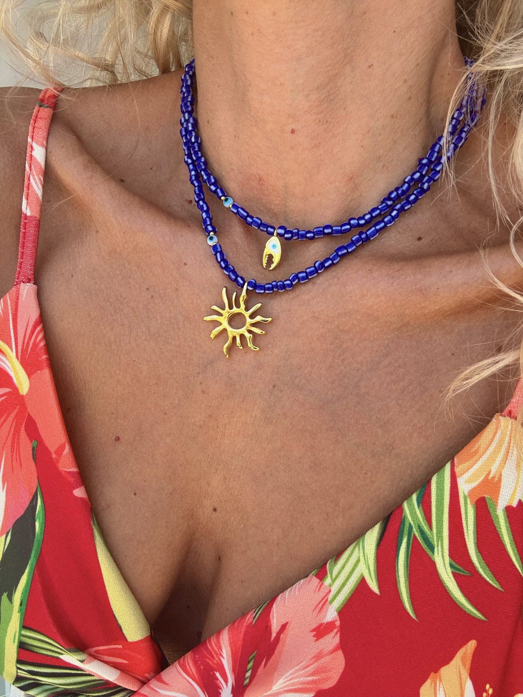 Aegean blue beaded summer necklace with sun