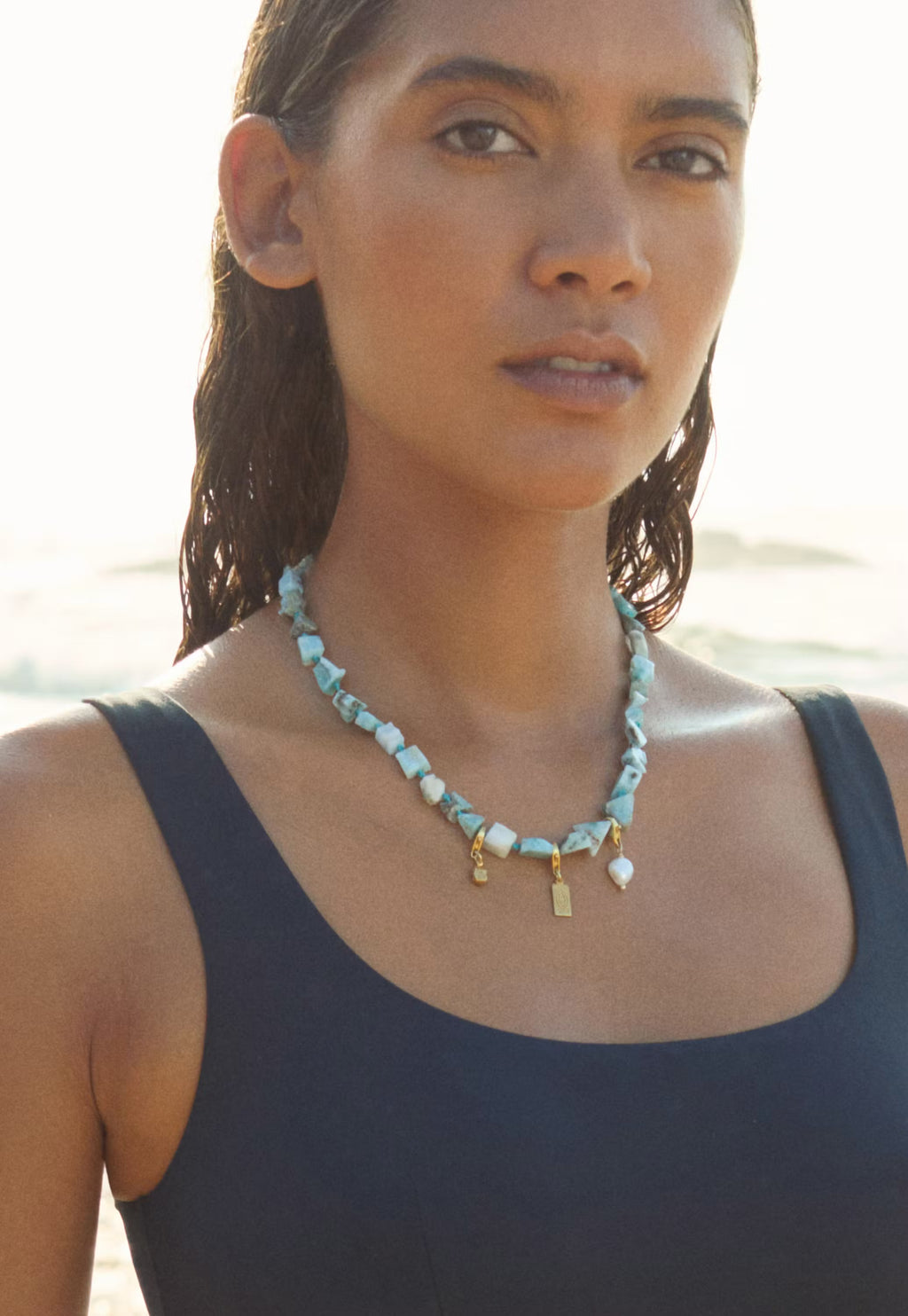 Larimar pebble and charms necklace-1.jpeg
